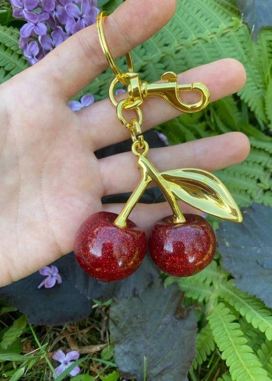 Breloque cerise dorée