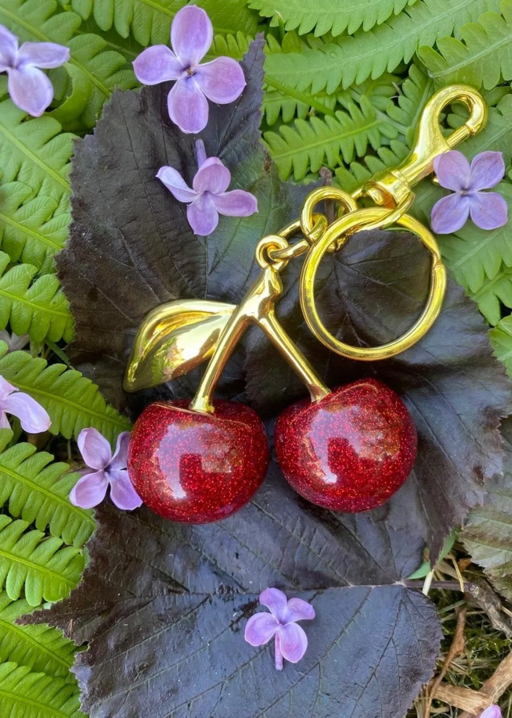 Breloque cerise dorée