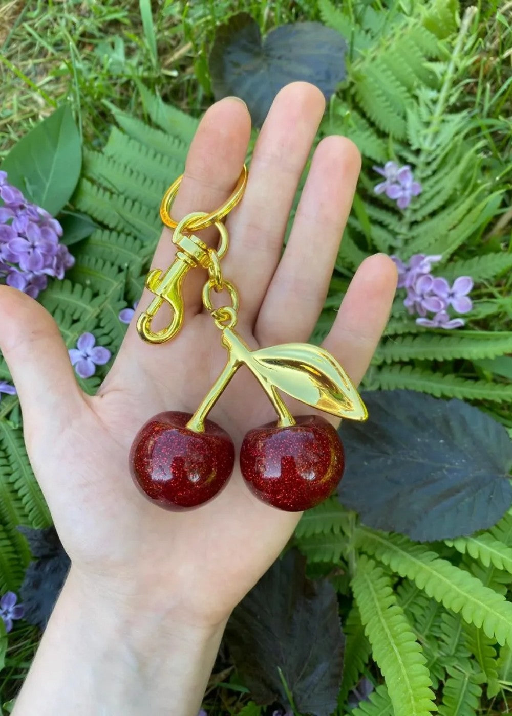 Breloque cerise dorée