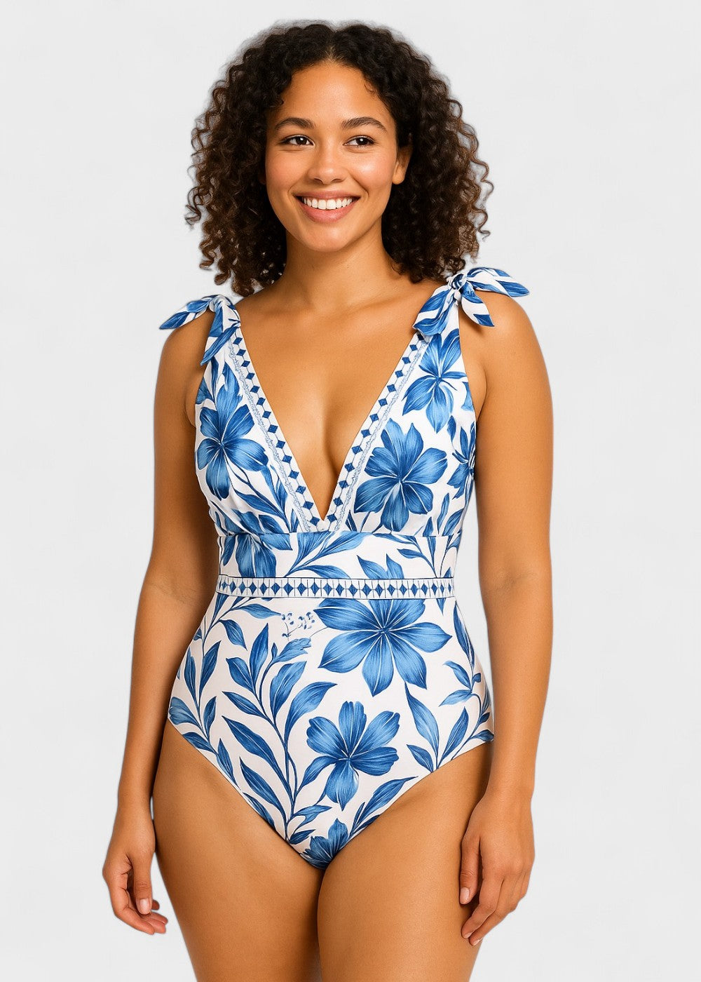 Maillot de bain bleu bohème à fleurs avec décolleté en V et jupe, lacé devant
