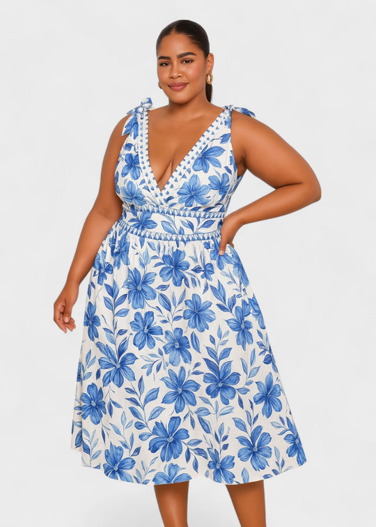 Maillot de bain bleu bohème à fleurs avec décolleté en V et jupe, lacé devant