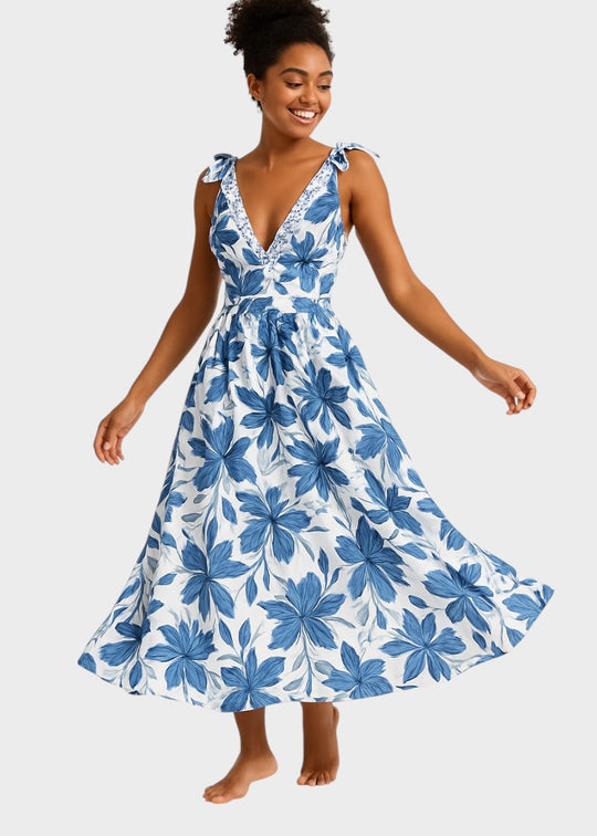 Maillot de bain bleu bohème à fleurs avec décolleté en V et jupe, lacé devant