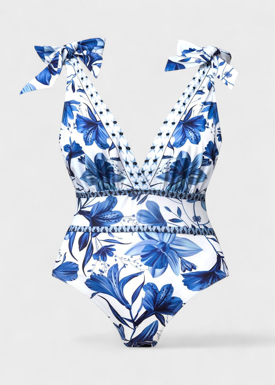 Maillot de bain bleu bohème à fleurs avec décolleté en V et jupe, lacé devant